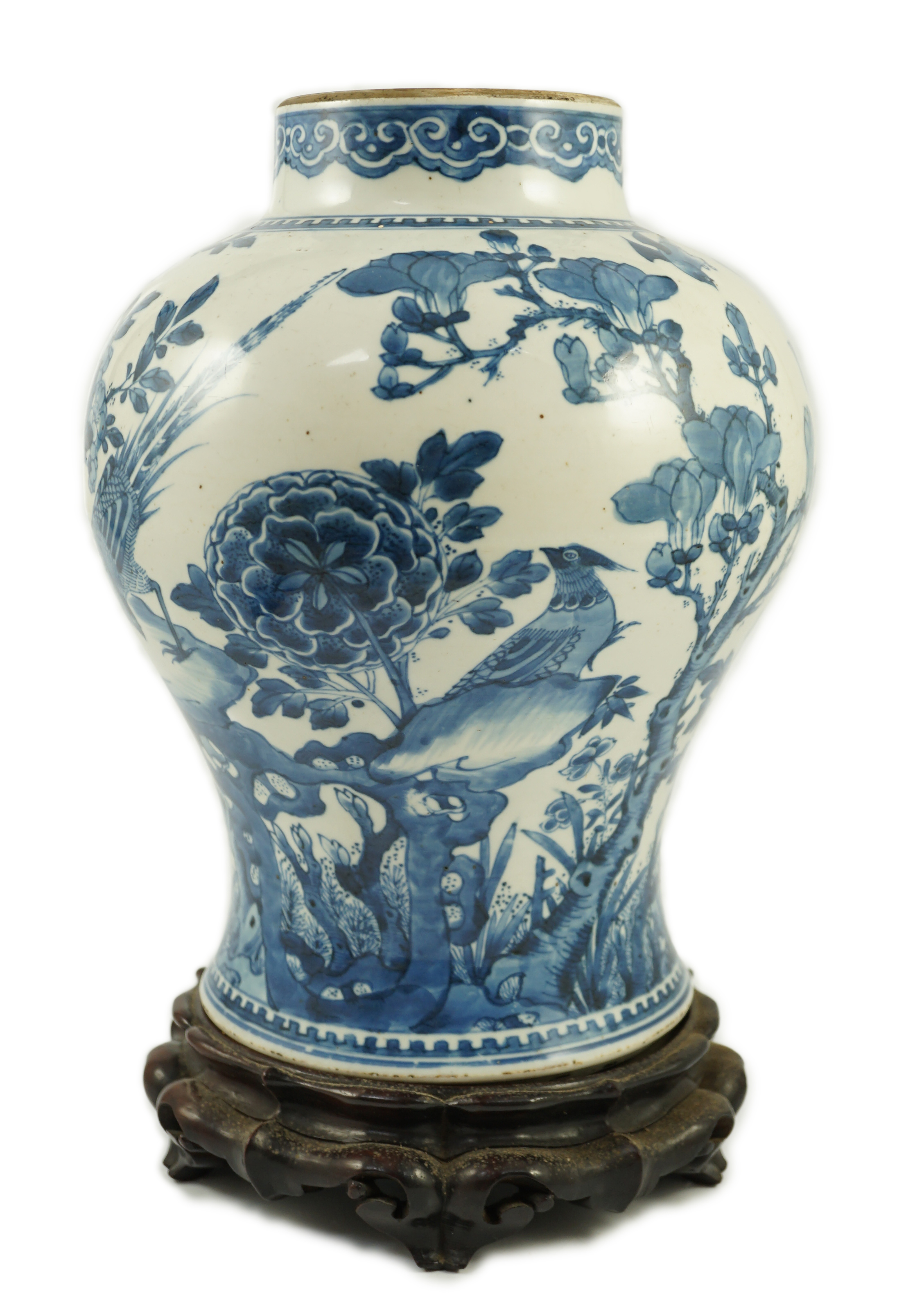 A Chinese blue and white ‘birds and blossom’ baluster vase, Kangxi period